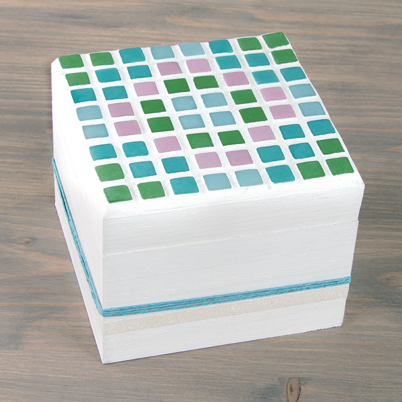 Wooden box with mosaics