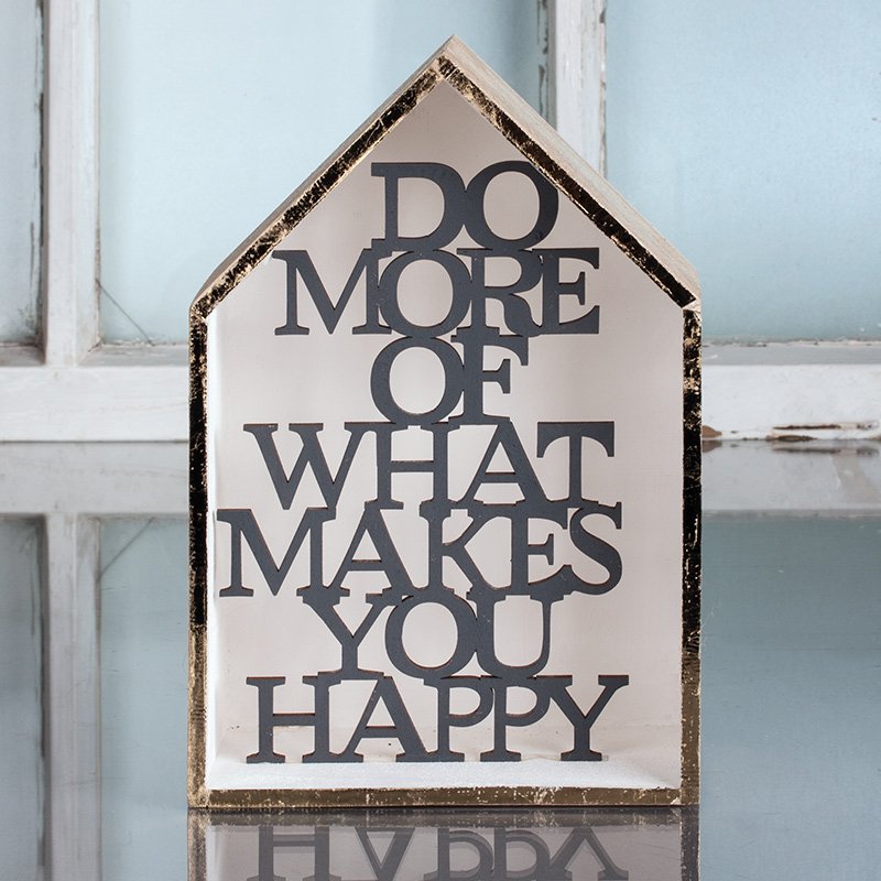 Wooden house „Do more of what makes you happy“