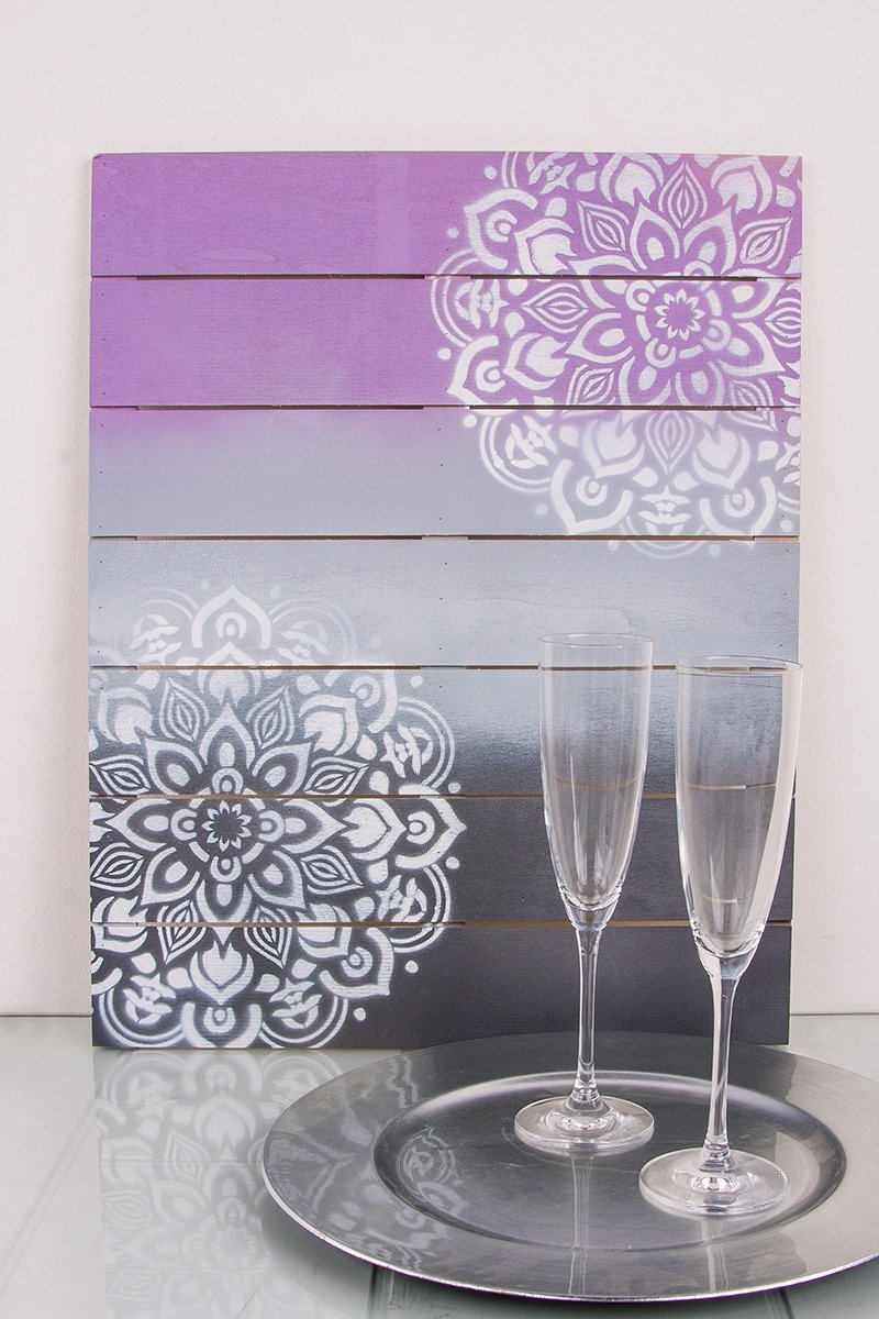 Frame out of wooden slats with Mandala