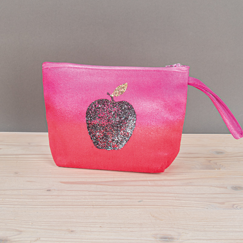 Cosmetic bag with glimmering apple