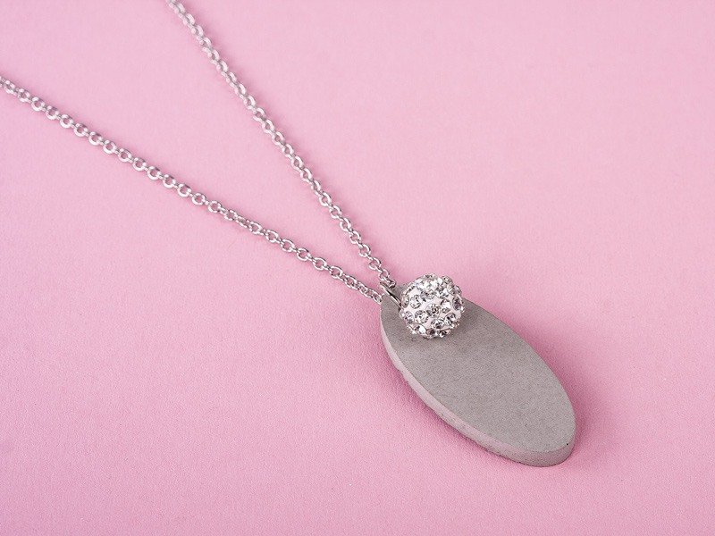 Oval jewellery-cement pendant with Shamballa