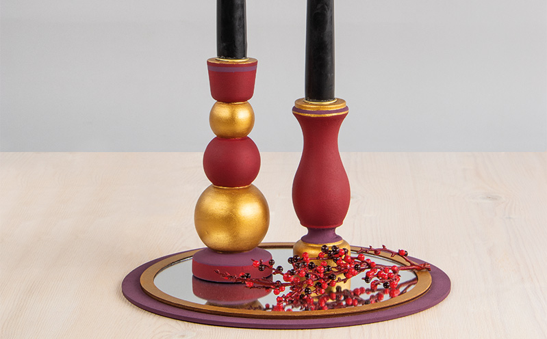 Spiegelplatte mit Kerzenständer