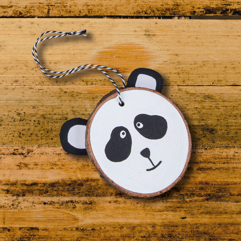 Tiergesichter auf Holzscheiben - Panda