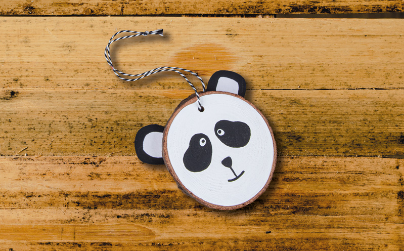 Tiergesichter auf Holzscheiben - Panda
